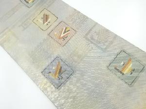 色紙に抽象鳥模様織出し袋帯